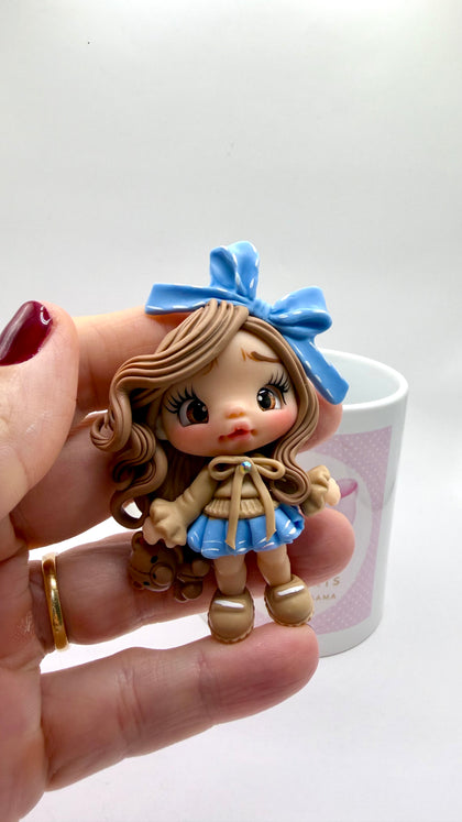 Blue Bow Clay Dolls