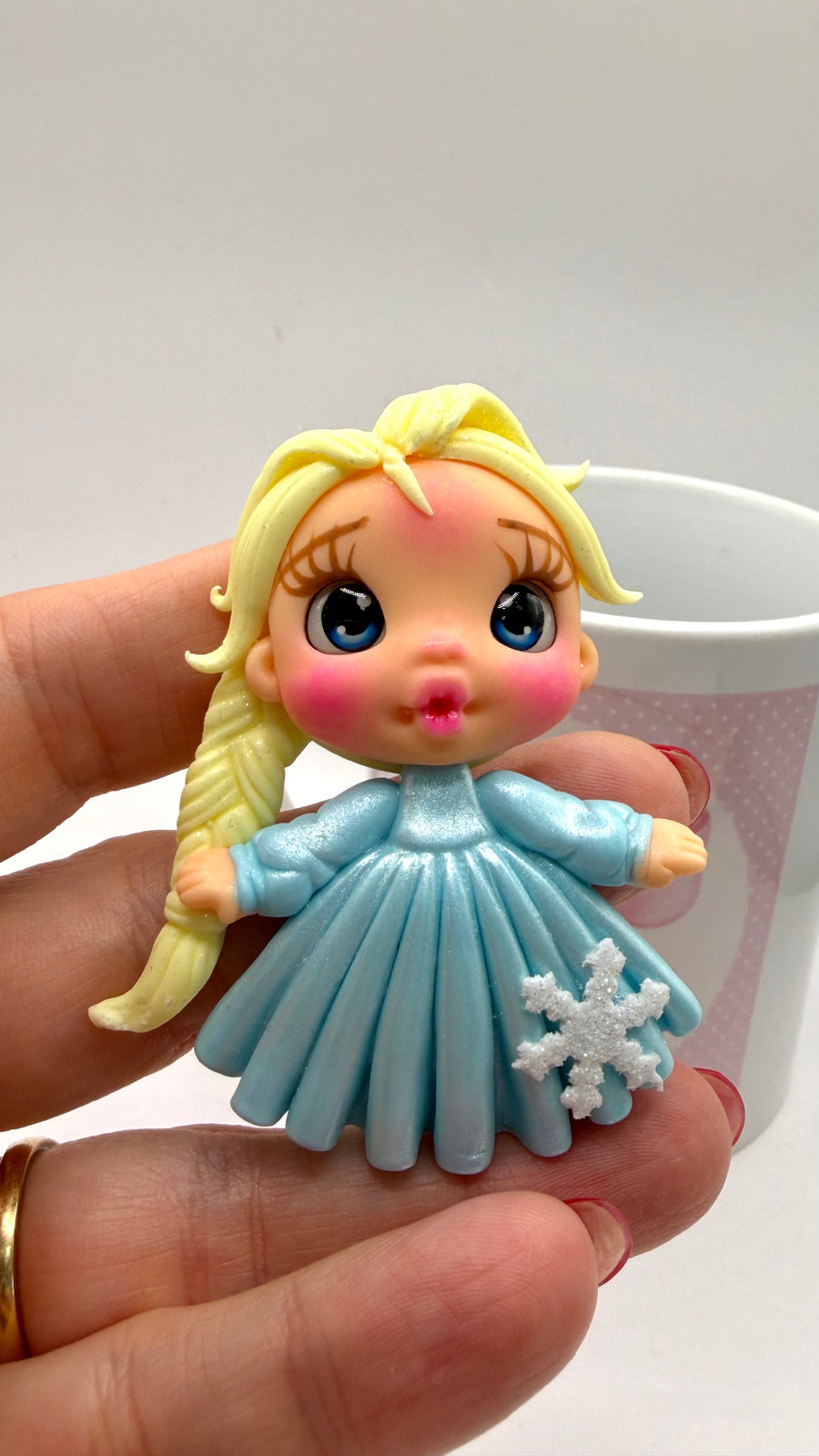 Frozen Clay Doll