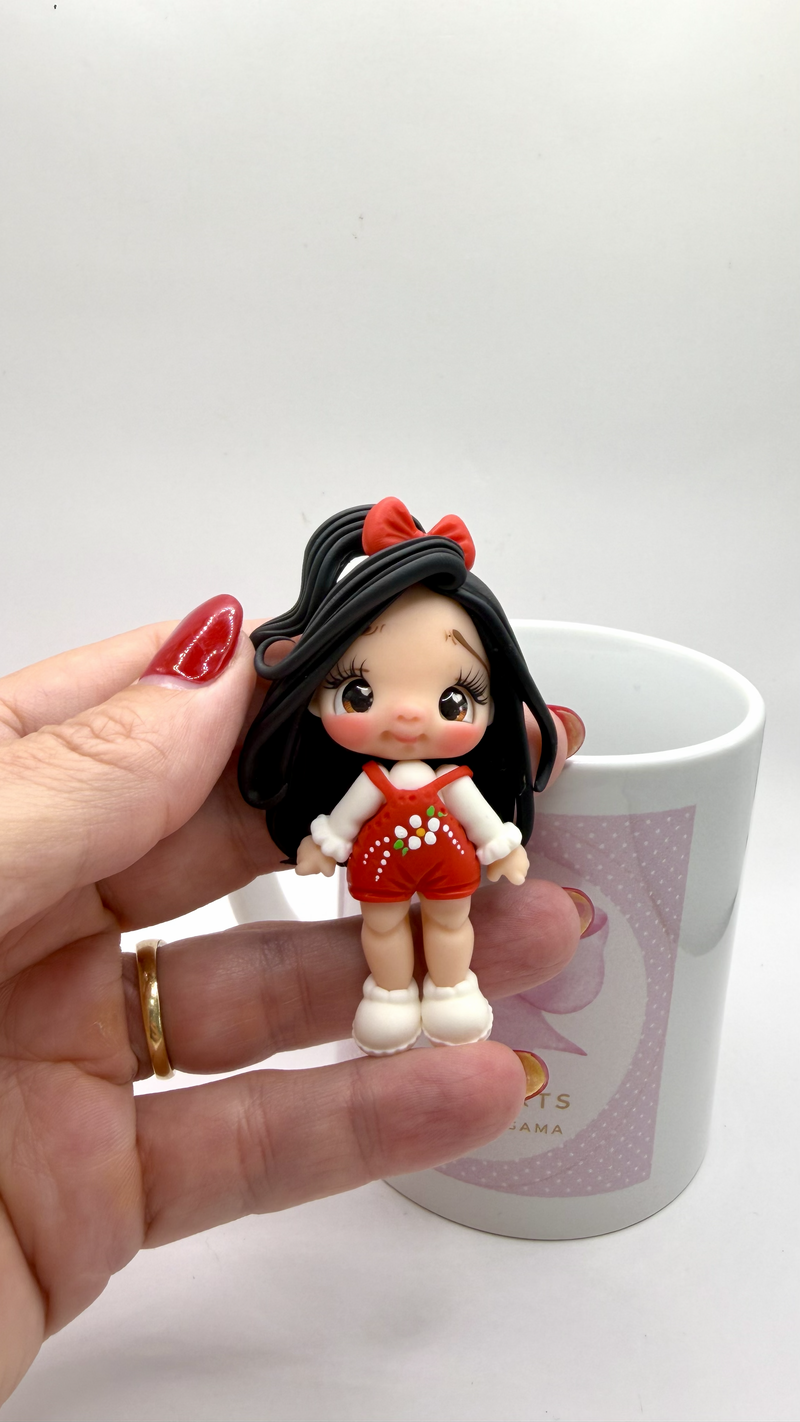 Red Girl Clay Doll