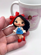 Red Ribbon Clay Doll