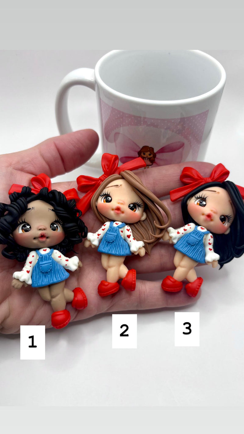 Red Ribbon Clay Doll